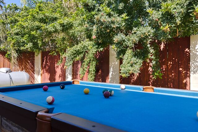 Outdoor dining area at Athena Ares Seaside Estate, South Padre Island