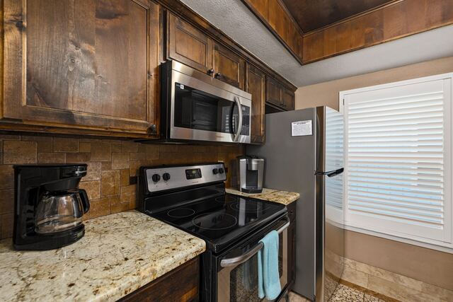 Pool with arches and palms at Athena Ares Seaside Estate, South Padre Island
