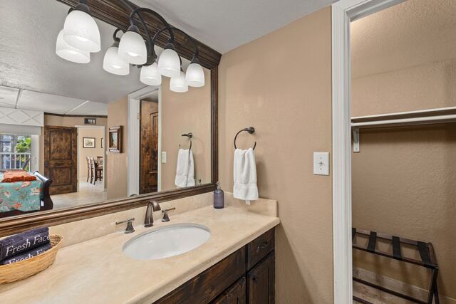 Outdoor poolside seating at Athena Ares Seaside Estate, South Padre Island